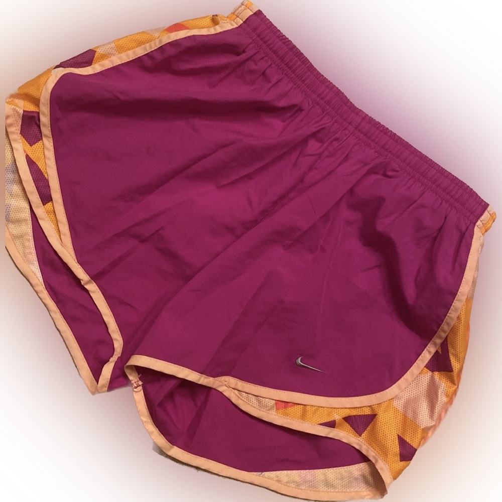Women’s Nike Dri Fit shorts in purple with bright orange size medium